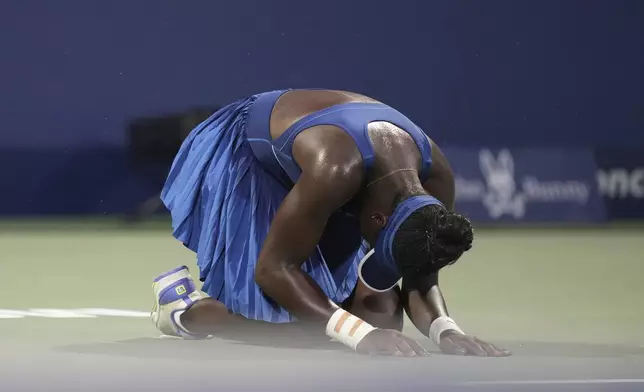Victoria Mboko of Canada celebrates her win over Naomi Osaka of Japan during finals tennis action at the National Bank Open in Montreal on Thursday, Aug. 7, 2025. (Christinne Muschi/The Canadian Press via AP)