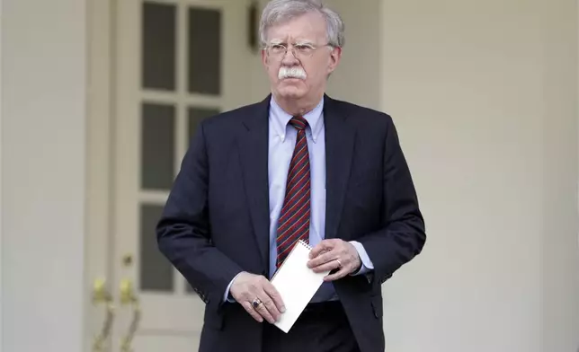 FILE - National security adviser John Bolton speaks about Venezuela outside the West Wing of the White House, April 30, 2019, in Washington. (AP Photo/Evan Vucci, File)