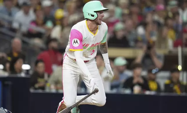 San Diego Padres' Jackson Merrill watches his two-RBI single during the fifth inning of a baseball game against the St. Louis Cardinals Friday, Aug. 1, 2025, in San Diego. (AP Photo/Gregory Bull)