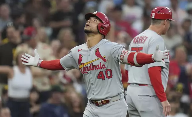 St. Louis Cardinals' Willson Contreras celebrates after hitting a home run during the fifth inning of a baseball game against the San Diego Padres Friday, Aug. 1, 2025, in San Diego. (AP Photo/Gregory Bull)