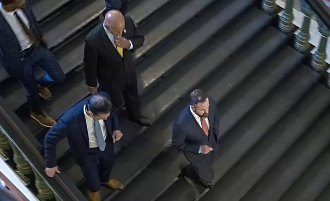 House Speaker Dustin Borrow, R - Lubbock, leaves the House floor on his way to a Republican Caucus meeting after Sine Die for the special session, Friday, Aug. 15, 2025, in Austin, Texas. (AP Photo/Rodolfo Gonzalez)