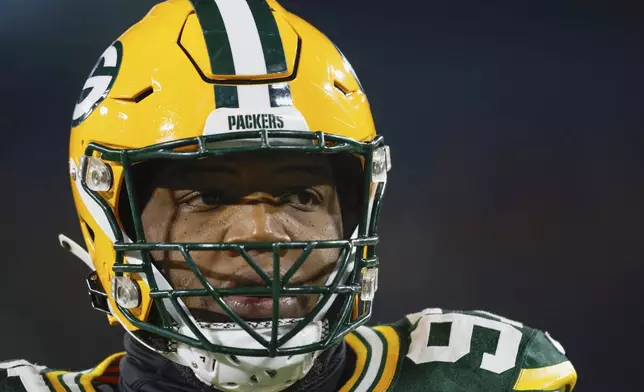 FILE - Green Bay Packers defensive tackle Kenny Clark (97) walks on the field before a NFL football game against the New Orleans Saints Monday, Dec. 23, 2024, in Green Bay, Wis. (AP Photo/Jeffrey Phelps, File)