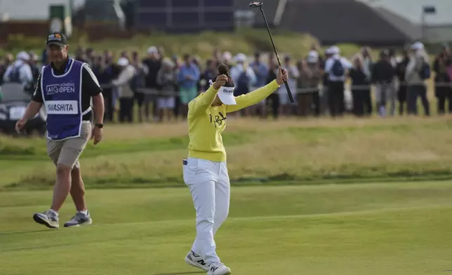 Miyu Yamashita of Japan reacts after winning the Women's British Open golf championship, at Royal Porthcawl Golf Club in Porthcawl, Wales, Sunday, Aug. 3, 2025. (AP Photo/Kin Cheung)
