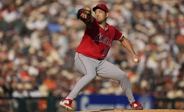 Los Angeles Angels starting pitcher Yusei Kikuchi throws during the first inning of a baseball game against the Detroit Tigers, Saturday, Aug. 9, 2025, in Detroit. (AP Photo/Ryan Sun)