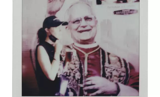 A mural of Pope Leo XIV is seen on the concourse during a Chicago Cubs versus Chicago White Sox Crosstown Classic series baseball game Sunday, July 27, 2025, in Chicago. (AP Photo/Erin Hooley)