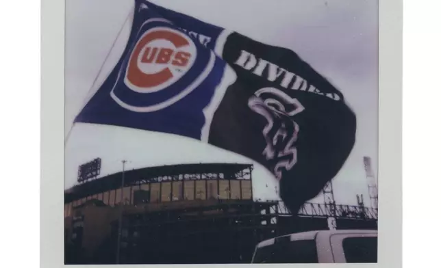 A flag is displayed at a tailgate party before a Chicago Cubs versus Chicago White Sox Crosstown Classic series baseball game Saturday, July 26, 2025, in Chicago. (AP Photo/Erin Hooley)