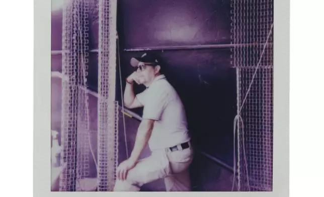 Veteran groundskeeper Jose Diaz watches the field during a Chicago Cubs versus Chicago White Sox Crosstown Classic series baseball game Sunday, July 27, 2025, in Chicago. (AP Photo/Erin Hooley)