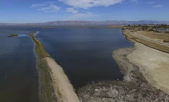 The Pond A1 site, center, for the South Bay Salt Pond Restoration Project is photographed Thursday, Aug. 7, 2025, in Mountain View, Calif. (AP Photo/Godofredo A. Vásquez)