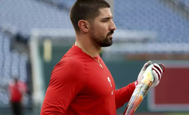 Philadelphia Phillies' Nick Castellanos looks on before a baseball game against the Washington Nationals, Friday, Aug. 15, 2025, in Washington. (AP Photo/Daniel Kucin Jr.)