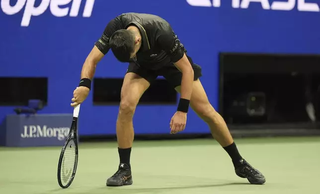 Novak Djokovic, of Serbia, reacts during a match against Learner Tien, of the United States, in the first-round of the U.S. Open tennis championships, Sunday, Aug. 24, 2025, in New York. (AP Photo/Frank Franklin II)