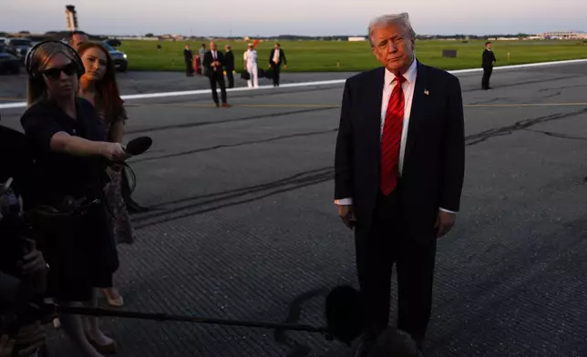 President Donald Trump speaks with reporters before boarding Air Force One at Lehigh Valley International Airport, Sunday, Aug. 3, 2025, in Allentown, Pa. (AP Photo/Julia Demaree Nikhinson)