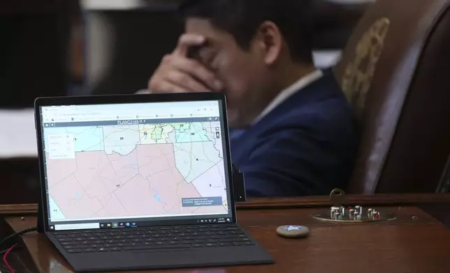Texas state Rep. Gene Wu, D-Houson, sits through debate over a redrawn U.S. congressional map in Texas during a special session, Wednesday, Aug. 20, 2025, in Austin, Texas. (AP Photo/Eric Gay)