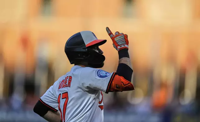 Baltimore Orioles' Colton Cowser rounds the bases after hitting a home run during the second inning of a baseball game against the Boston Red Sox, Monday, Aug. 25, 2025, in Baltimore. (AP Photo/Stephanie Scarbrough)