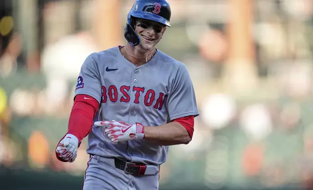 Boston Red Sox's Roman Anthony rounds the bases after hitting a home run during the first inning of a baseball game against the Baltimore Orioles, Monday, Aug. 25, 2025, in Baltimore. (AP Photo/Stephanie Scarbrough)