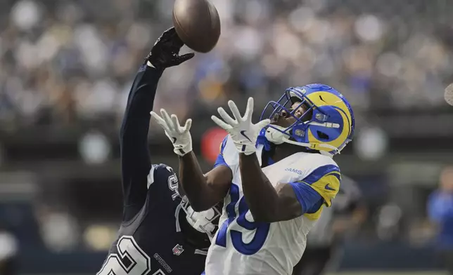 Los Angeles Rams wide receiver Xavier Smith (19) makes a catch against the Dallas Cowboys during the first half of an NFL preseason football game, Saturday, Aug. 9, 2025, in Inglewood, Calif. (AP Photo/Wally Skalij)