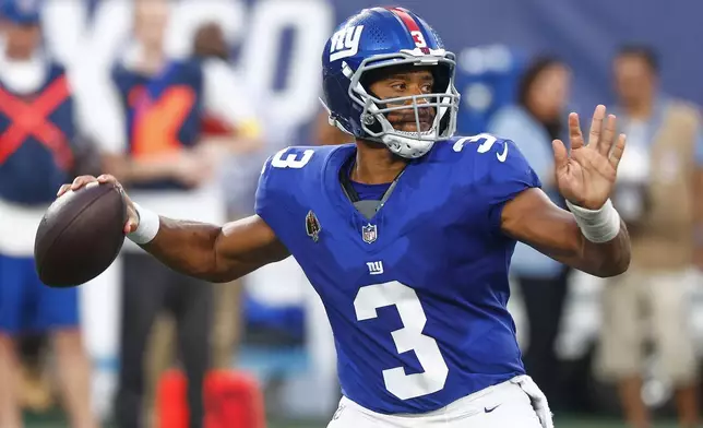 New York Giants quarterback Russell Wilson (3) passes the ball against the New York Jets during the first quarter of an NFL football game, Saturday, Aug. 16, 2025, in East Rutherford, N.J. (AP Photo/Noah K. Murray)