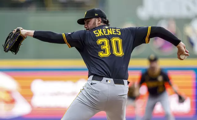 Pittsburgh Pirates Paul Skenes throws to the Milwaukee Brewers during the first inning of a baseball game, Tuesday, Aug.12, 2025, in Milwaukee. (AP Photo/Jeffrey Phelps)