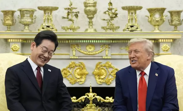 President Donald Trump, right, meets with South Korean President Lee Jae Myung in the Oval Office of the White House, Monday, Aug. 25, 2025, in Washington. (AP Photo/Alex Brandon)