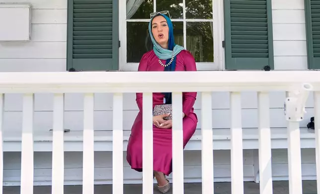 Yasmin Elhady, a matchmaker featured on the series "Muslim Matchmaker" on Hulu, poses in Falls Church, Va., on Tuesday, Aug. 12, 2025. (AP Photo/Mariam Zuhaib)