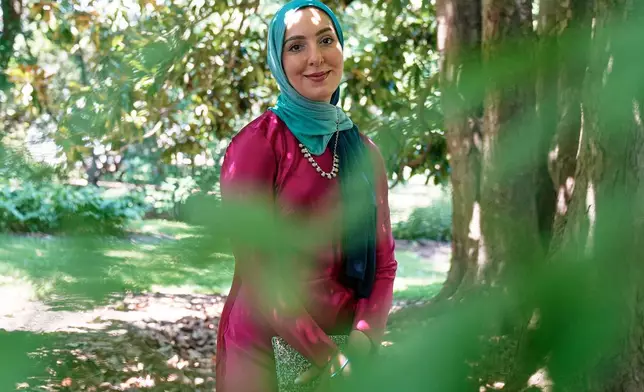 Yasmin Elhady, a matchmaker featured on the series "Muslim Matchmaker" on Hulu, poses in Falls Church, Va., on Tuesday, Aug. 12, 2025. (AP Photo/Mariam Zuhaib)