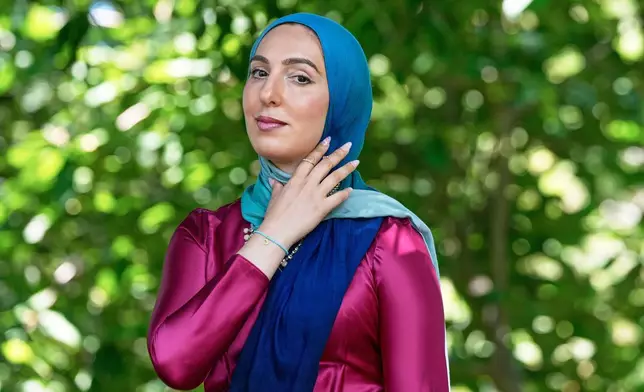 Yasmin Elhady, a matchmaker featured on the series "Muslim Matchmaker" on Hulu, poses in Falls Church, Va, on Tuesday, Aug. 12, 2025. (AP Photo/Mariam Zuhaib)