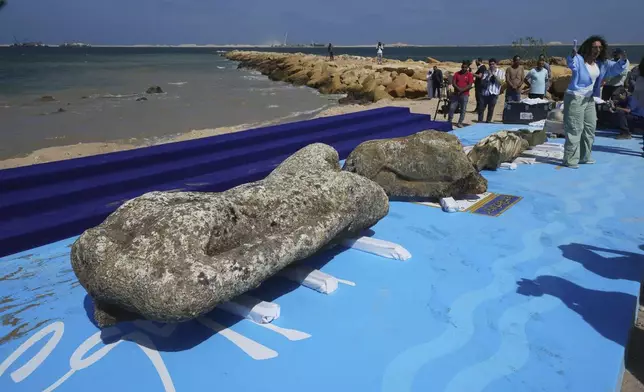 Ancient artifacts are on display after they were lifted out of the water in Abu Qir Bay at the Mediterranean city of Alexandria, Egypt, Thursday, Aug. 21, 2025. (AP Photo/Amr Nabil)