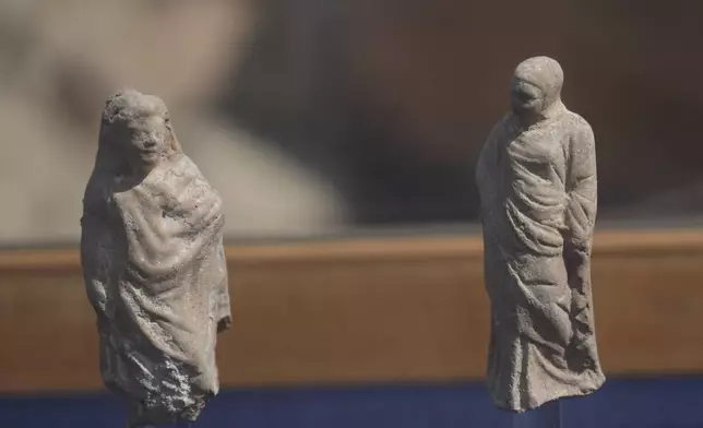 Ancient artifacts are on display after they were lifted out of the water in Abu Qir Bay at he Mediterranean city of Alexandria, Egypt, Thursday, Aug. 21, 2025. (AP Photo/Amr Nabil)