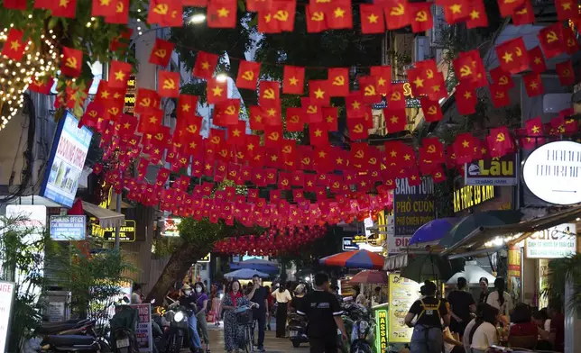 Vietnam's national flag displayed as the nation celebrating Vietnam's 80th National Day in Hanoi, Friday, Aug. 29, 2025. (AP Photo/Vincent Thian)