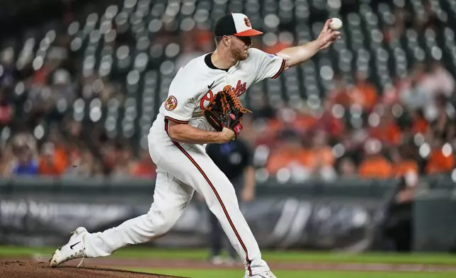 Baltimore Orioles starting pitcher Trevor Rogers delivers during the first inning of a baseball game against the Seattle Mariners, Wednesday, Aug. 13, 2025, in Baltimore. (AP Photo/Stephanie Scarbrough)
