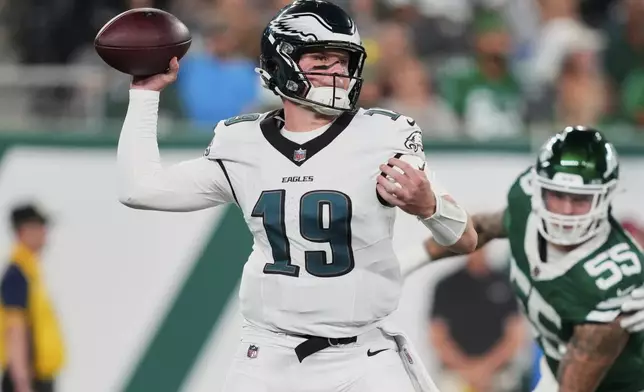 Philadelphia Eagles quarterback Kyle McCord (19) passes in the first half of a preseason NFL football game against the New York Jets in East Rutherford, N.J., Friday, Aug. 22, 2025. (AP Photo/Yuki Iwamura)