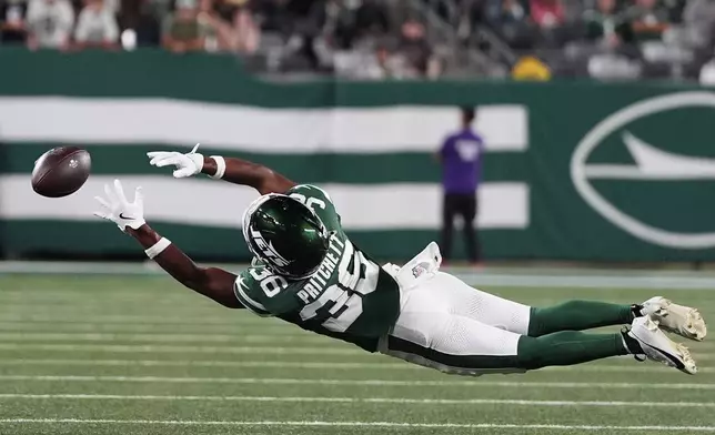 New York Jets wide receiver Jamaal Pritchett (36) dives for a pass in the second half of a preseason NFL football game against the Philadelphia Eagles in East Rutherford, N.J., Friday, Aug. 22, 2025. (AP Photo/Yuki Iwamura)