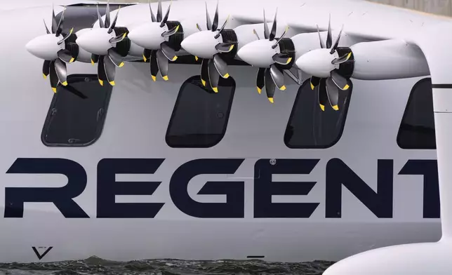 S ix of the twelve propeller-driven, electric engines hang from the REGENT Viceroy Seaglider, a winged passenger ferry, during a test run on Narragansett Bay, Wednesday, Aug. 6, 2025, off the coast of North Kingstown, R.I. (AP Photo/Charles Krupa)
