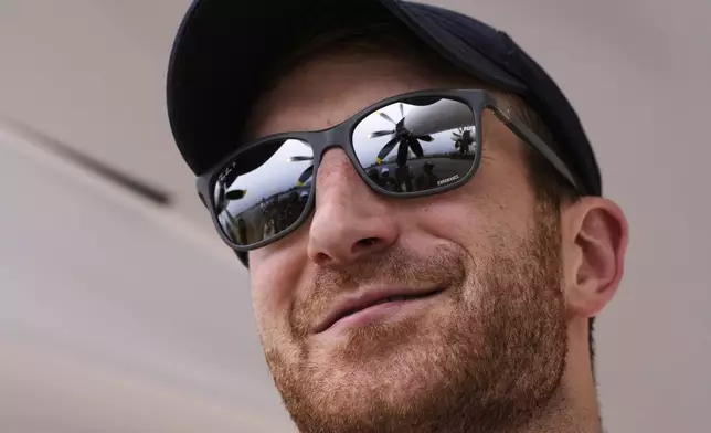 Billy Thalheimer, CEO and Co-Founder of REGENT, smiles during an interview after piloting the Viceroy Seaglider, a winged passenger ferry, at a dock on Narragansett Bay, Wednesday, Aug. 6, 2025, in North Kingstown, R.I. (AP Photo/Charles Krupa)