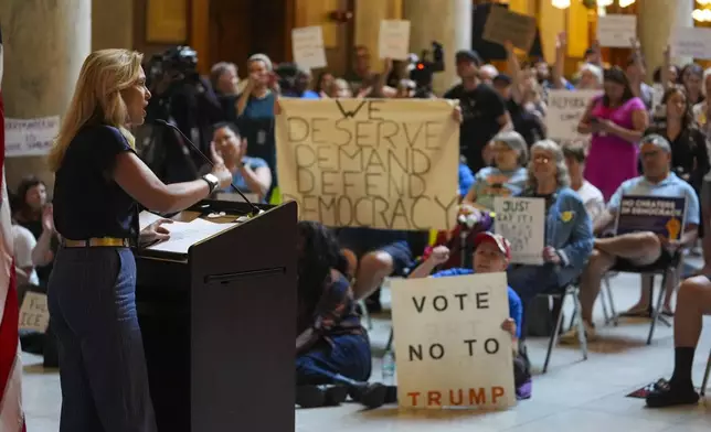 Sen Shelli Yoder, R-Bloomington, speaks at a rally protesting redistricting at the Statehouse in Indianapolis, Thursday, Aug. 7, 2025. (AP Photo/Michael Conroy)
