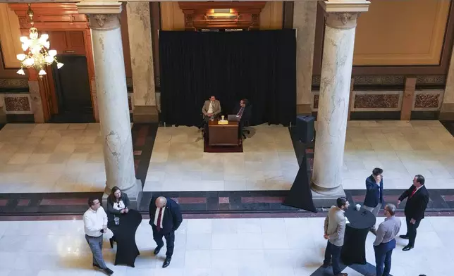 A curtain covers the entrance to the Governor's office ahead of a visit for Vice President JD Vance at the Indiana Statehouse in Indianapolis, Thursday, Aug. 7, 2025. (AP Photo/Michael Conroy)