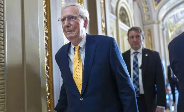 FILE -Sen. Mitch McConnell, R-Ky., the former Senate Republican leader and member of the Senate Appropriations Committee, leaves the chamber as the Senate votes to reject a war powers resolution authored by Sen. Tim Kaine of Virginia, aimed to affirm that Trump should seek authorization from Congress before launching more military action against Iran, at the Capitol in Washington, June 27, 2025. (AP Photo/J. Scott Applewhite), File)
