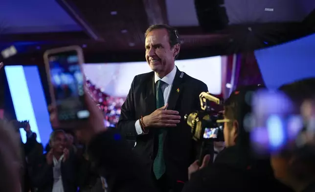 FILE - Presidential candidate Jorge "Tuto" Quiroga arrives at his campaign headquarter after early results in the presidential election in La Paz, Bolivia, Aug. 17, 2025. (AP Photo/Juan Karita, File)