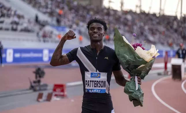FILE - Jacory Patterson of the United States celebrates after winning the men's 400 meters during a Diamond League athletics meeting in Rabat, Sunday, May 25, 2025. (AP Photo, File)