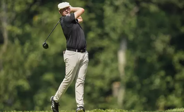 Harry Hall, of England, hits off the seventh tee during the final round of the BMW Championship golf tournament Sunday, Aug. 17, 2025, in Owings Mills, Md. (AP Photo/Stephanie Scarbrough)