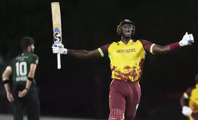 West Indies' Jason Holder reacts after hitting a four to win the second Twenty20 cricket match against Pakistan, Saturday, Aug. 2, 2025, in Lauderhill, Fla. (AP Photo/Lynne Sladky)