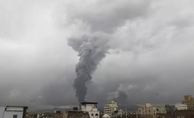 Smoke billows following Israeli airstrikes in multiple areas in Sanaa, Yemen, Sunday, Aug. 24, 2025. (AP Photo/Osamah Abdulrahman)