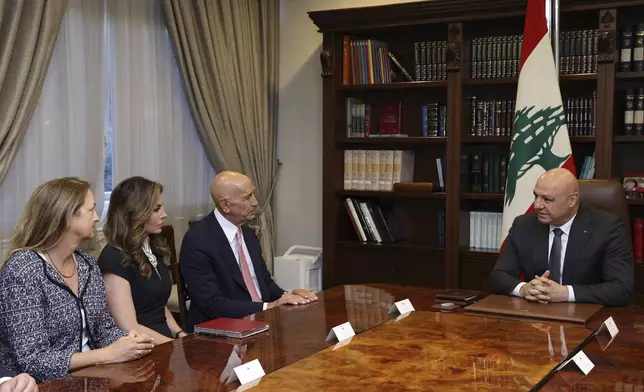 In this photo released by the Lebanese Presidency press office, Lebanese President Joseph Aoun, right, meets U.S. Ambassador to Turkey and Special Envoy to Syria Tom Barrack, third left, U.S. deputy special presidential envoy to the Middle East Morgan Ortagus, second left, and U.S. Ambassador to Lebanon Lisa A. Johnson, left, at the presidential palace in Baabda, in east of Beirut, Lebanon, Monday, Aug. 18, 2025. (Lebanese Presidency press office via AP)