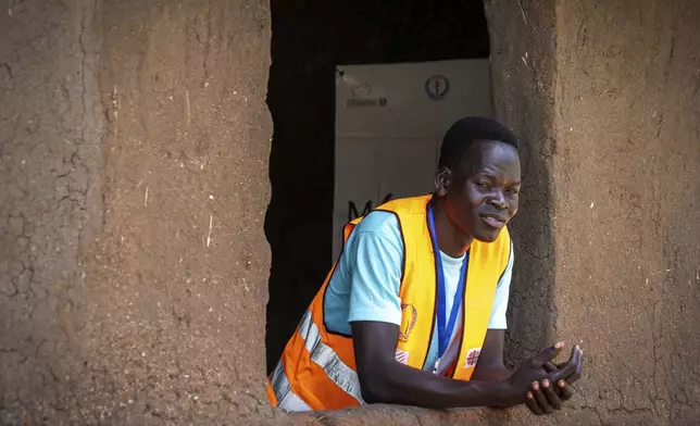 Samuel Riti John, 27, a Caritas Parish volunteer and facilitator of a Self Help Plus training, poses for a photo in Kotobi, Mundri West County, South Sudan, June 26, 2025. (AP Photo/Florence Miettaux)