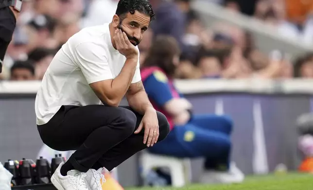 Manchester United manager Ruben Amorim reacts on the touchline during the English Premier League soccer match between Fulham and Manchester United at Craven Cottage, in London, Sunday Aug. 24, 2025. (Adam Davy/PA via AP)