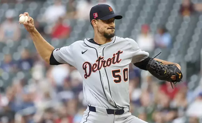 Detroit Tigers starting pitcher Charlie Morton (50) delivers against the Minnesota Twins during the first inning of a baseball game Friday, Aug. 15, 2025, in Minneapolis. (AP Photo/Matt Krohn)
