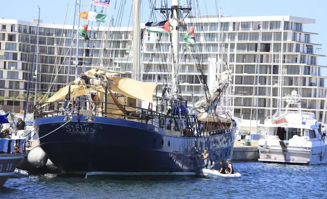 A ship that is part of the Global Sumud Flotilla prepares to depart to Gaza to deliver aid amidst Israel's blockade on the Palestinian territory, in the Tunisian port of Bizerte, Saturday, Sept. 13, 2025. (AP Photo/Anis Mili)