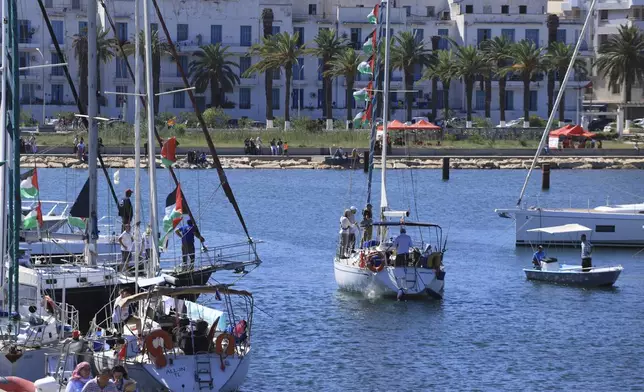 A boat that is part of the Global Sumud Flotilla departs to Gaza to deliver aid amidst Israel's blockade on the Palestinian territory, in the Tunisian port of Bizerte, Saturday, Sept. 13, 2025. (AP Photo/Anis Mili)