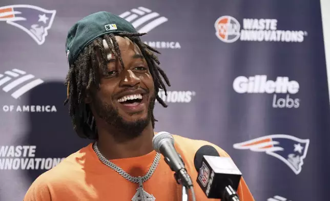 New England Patriots' Antonio Gibson talks after an NFL football game against the Miami Dolphins Sunday, Sept. 14, 2025, in Miami Gardens, Fla. (AP Photo/Lynne Sladky)