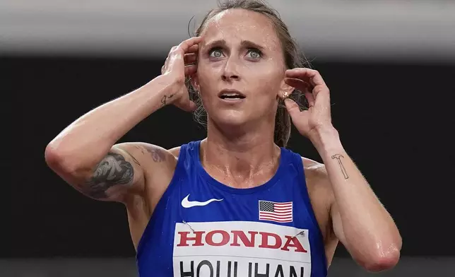 United States' Shelby Houlihan reacts after competing in women's 5,000 meters heat at the World Athletics Championships in Tokyo, Thursday, Sept. 18, 2025. (AP Photo/Eugene Hoshiko)