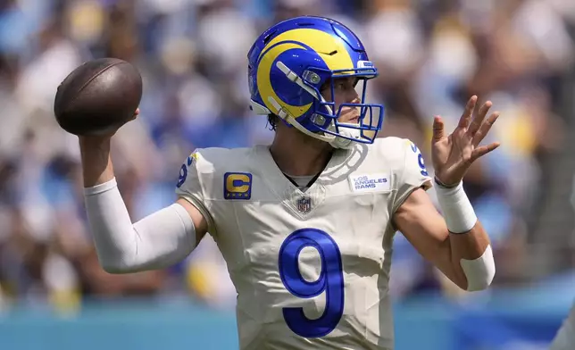 Los Angeles Rams quarterback Matthew Stafford passes during the first half of an NFL football game against the Tennessee Titans, Sunday, Sept. 14, 2025, in Nashville, Tenn. (AP Photo/George Walker IV)